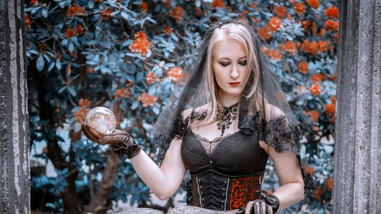Book cover featuring a sexy witch casting magic