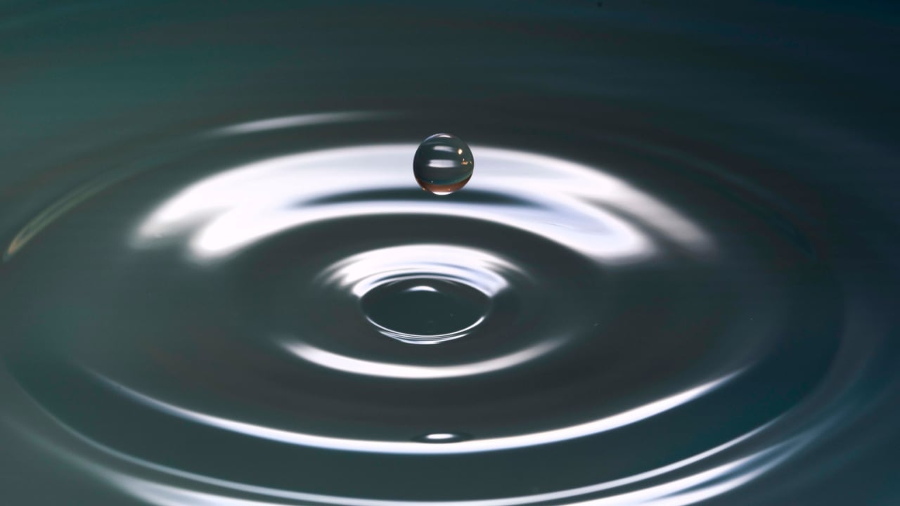 Photo of a drop of water with ripples