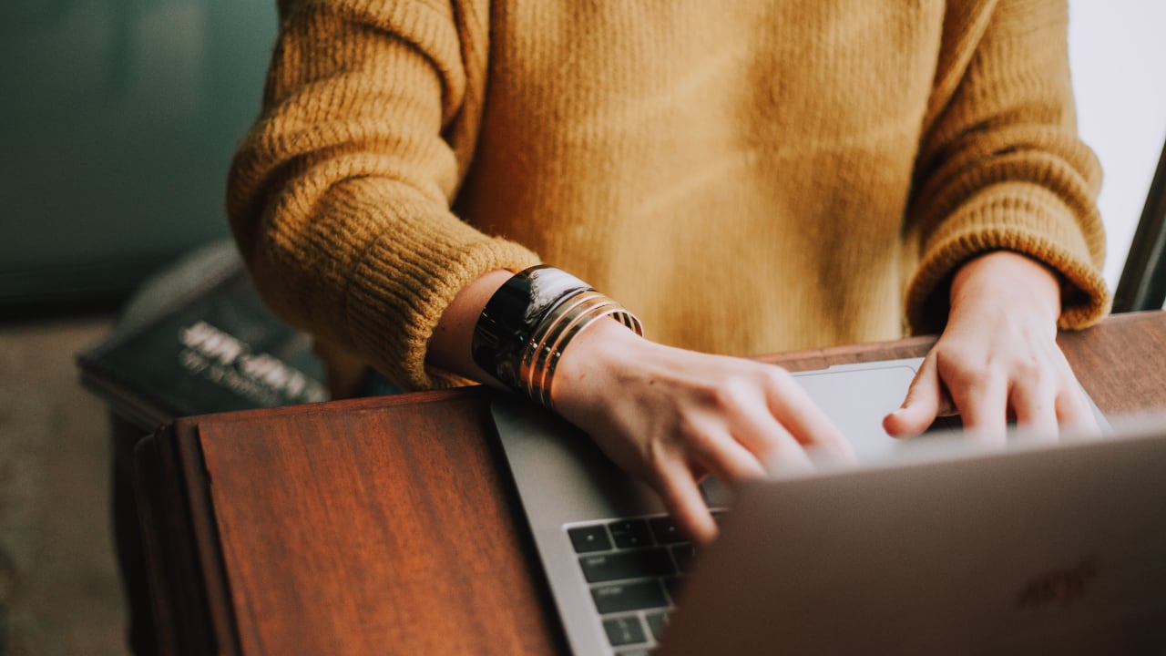 Photo of a woman on a laptop